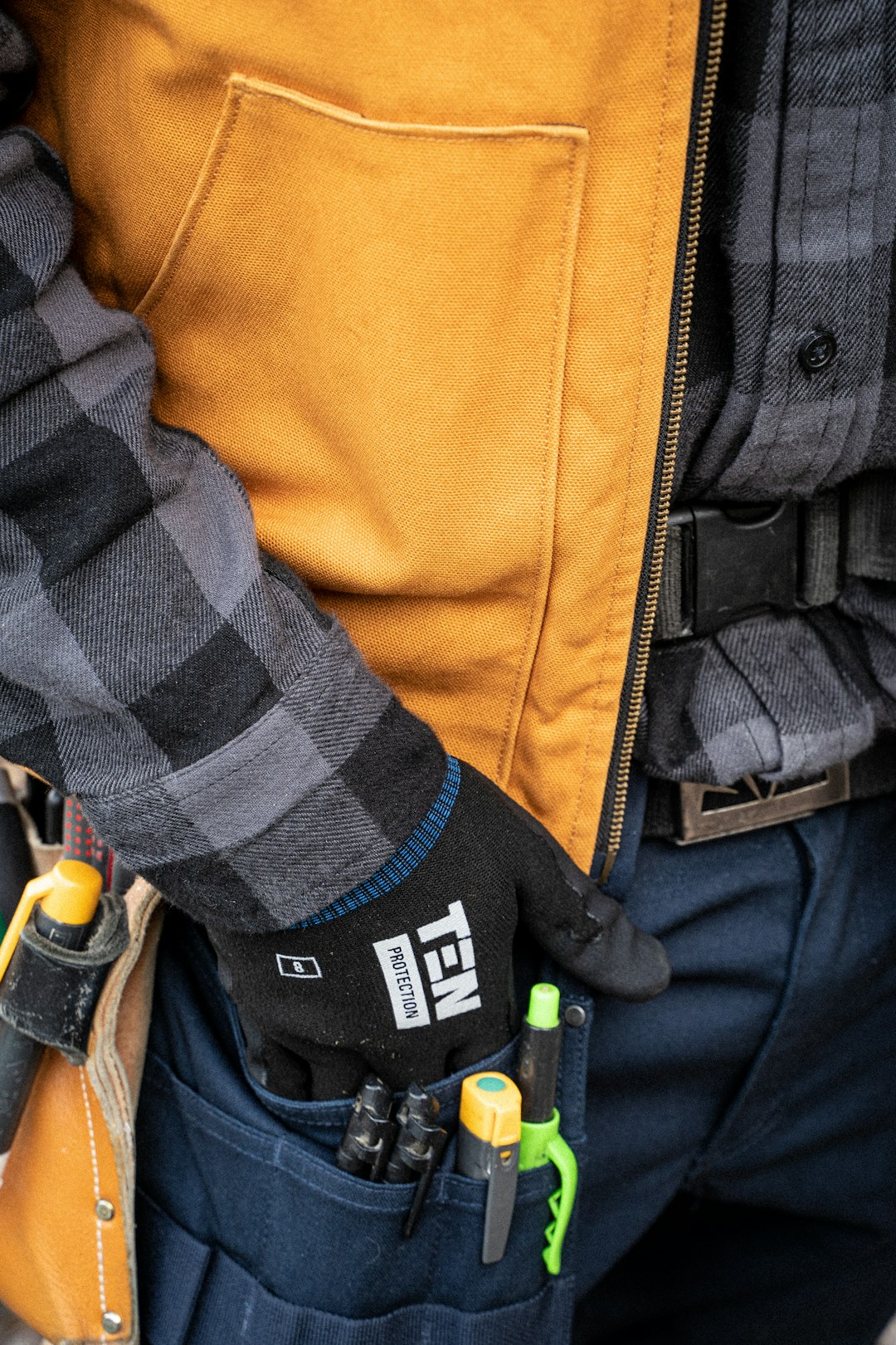 Ten Protection work gloves and tools for a electrician.